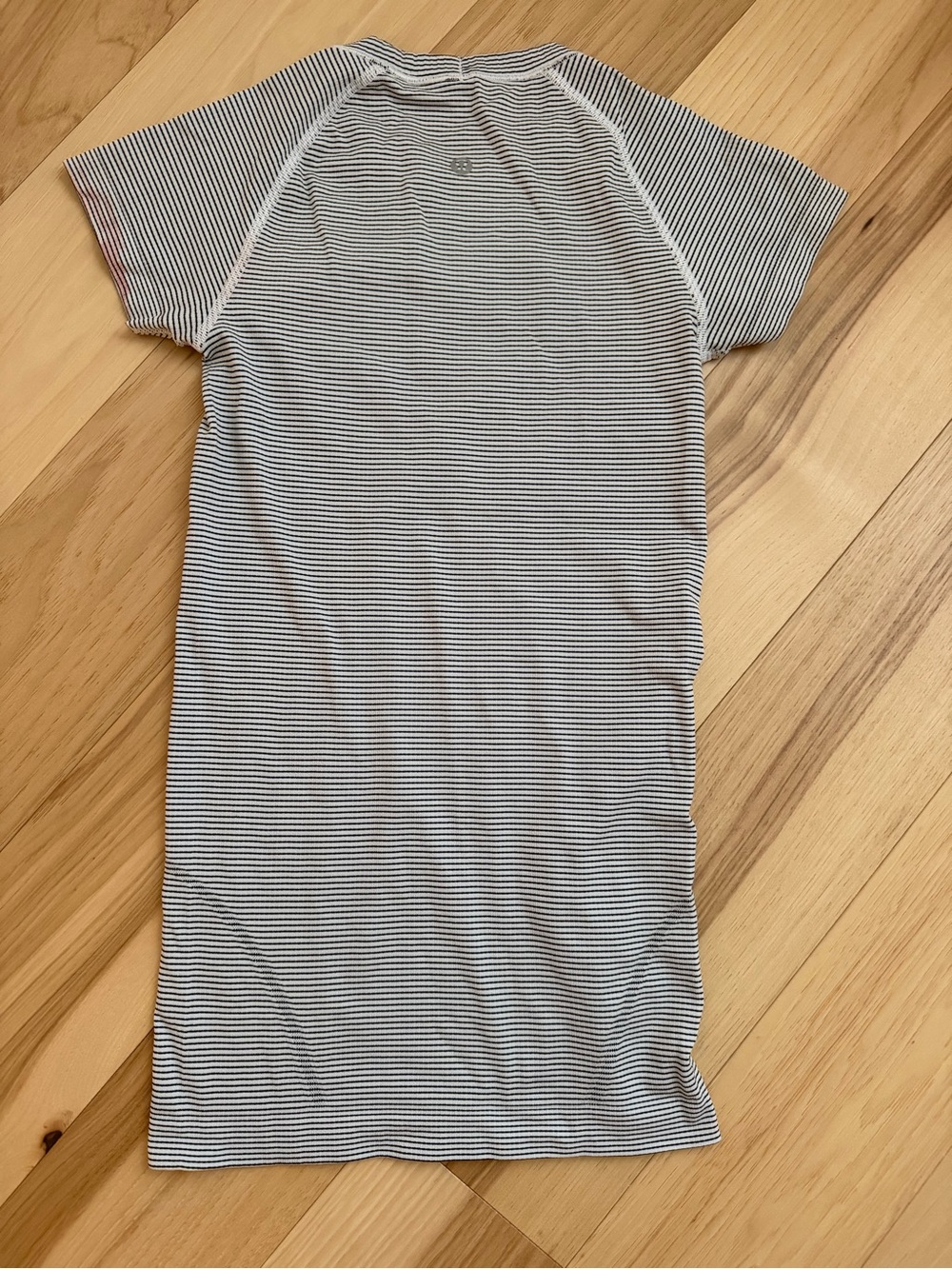 Women’s Black & White Thin-Stripe Crew Neck workout shirt.